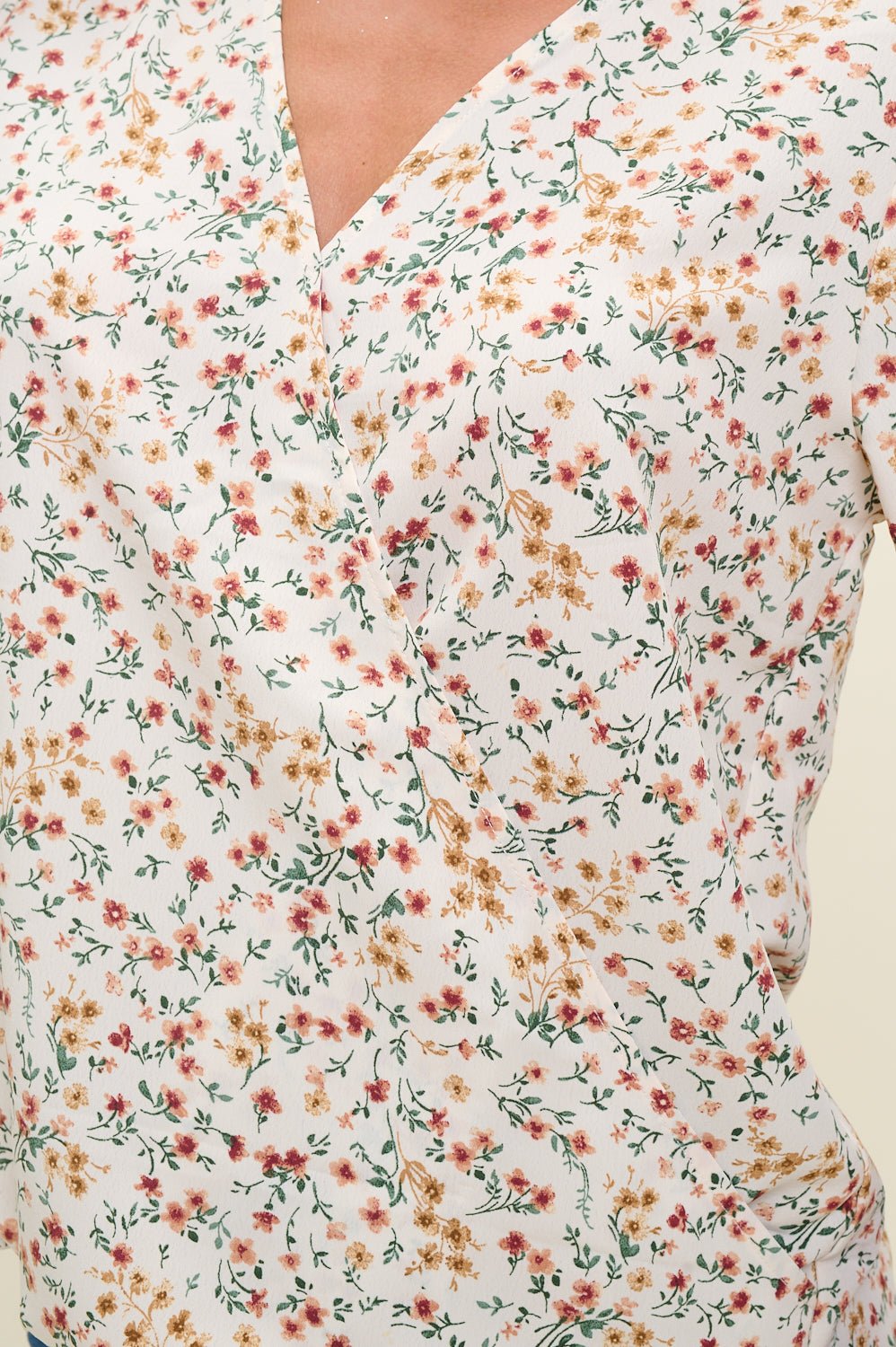 Image of West K Alexa Three Quarter Sleeve Surplice Roll Tab Blouse Ivory Ditzy Multi