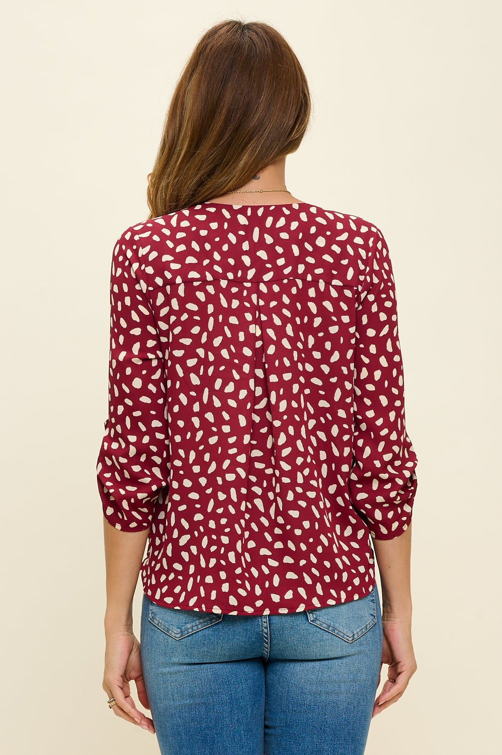 Image of West K Alexa Three Quarter Sleeve Surplice Roll Tab Blouse Red Dot