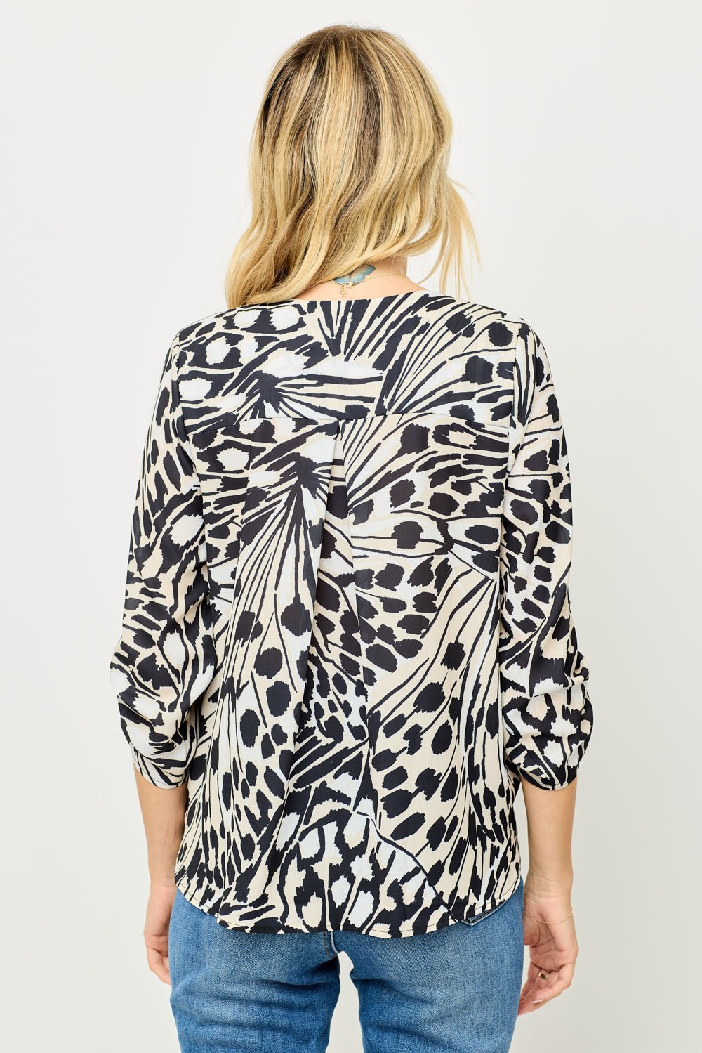 Image of West K Alexa Three Quarter Sleeve Surplice Rolltab Blouse Animal Multi