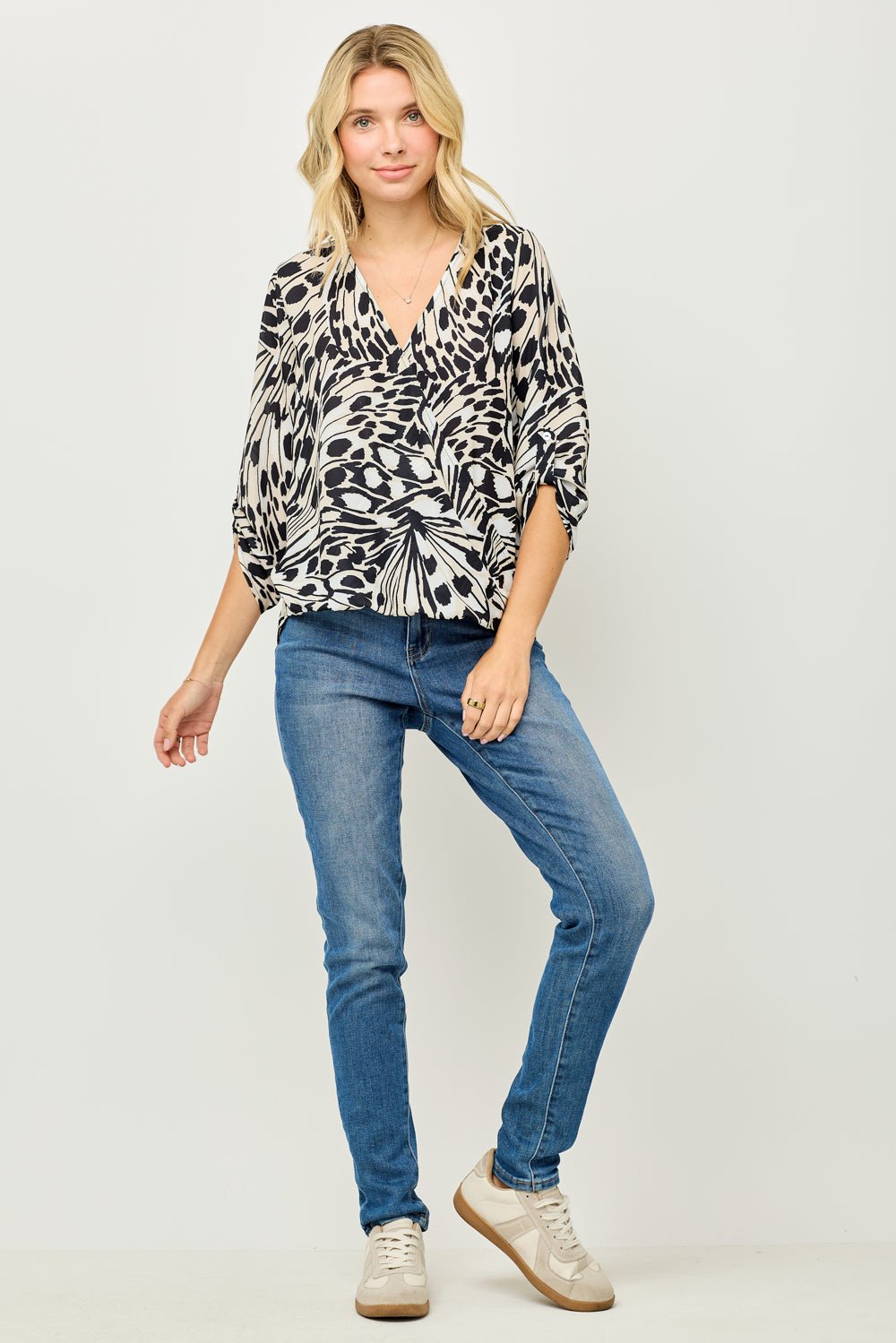 Image of West K Alexa Three Quarter Sleeve Surplice Rolltab Blouse Animal Multi