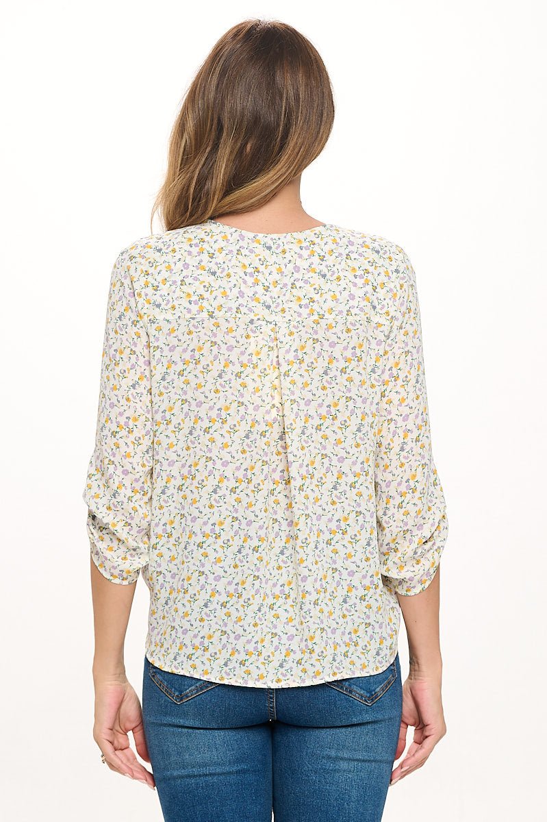 Image of West K Alexa Three Quarter Sleeve Surplice Rolltab Blouse Ivory Ditzy Floral
