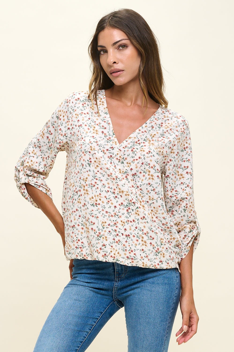Image of West K Alexa Three Quarter Sleeve Surplice Rolltab Blouse Ivory Ditzy Multi