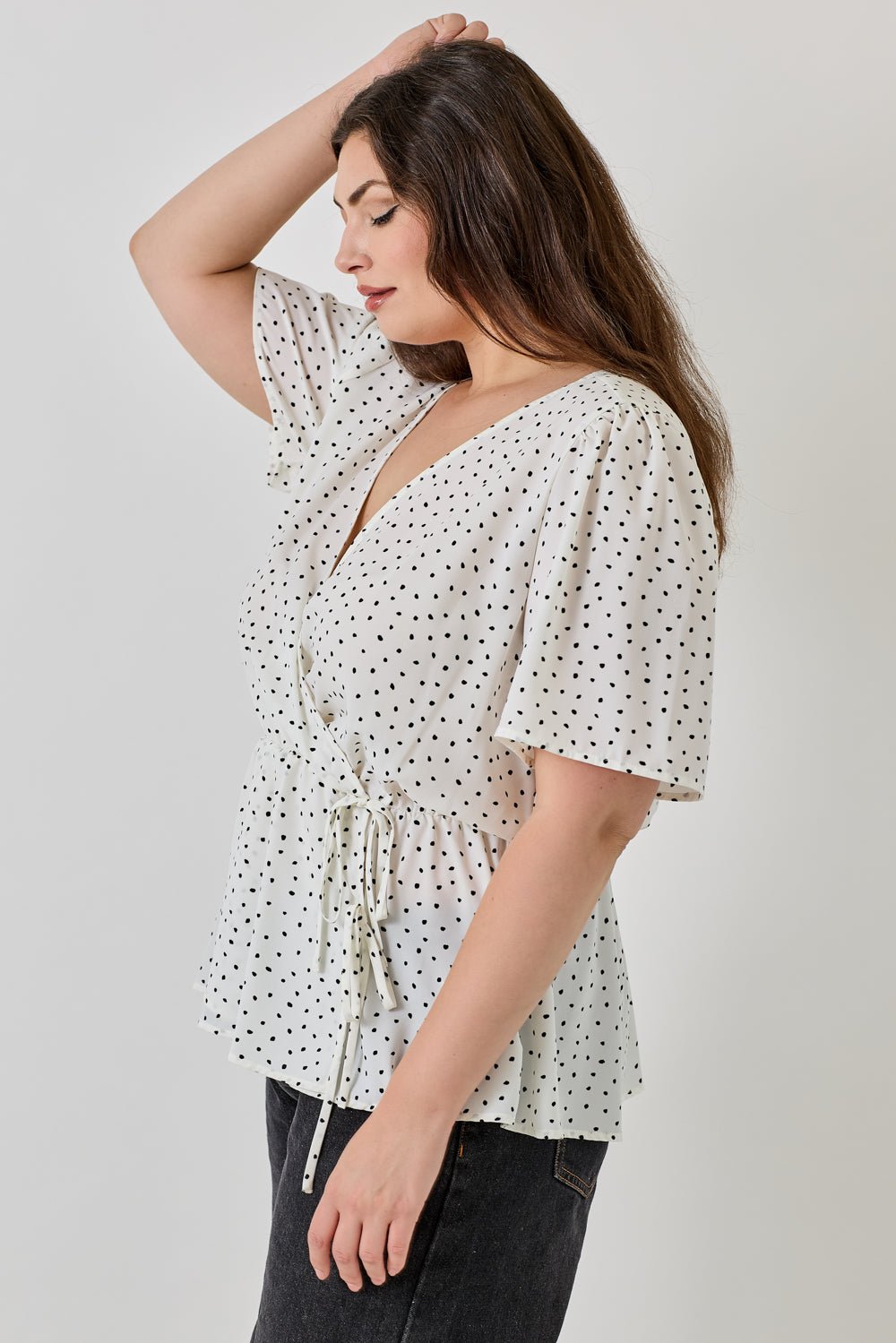 Image of West K Casey Plus Size Surplice Peplum Top Ivory Dot