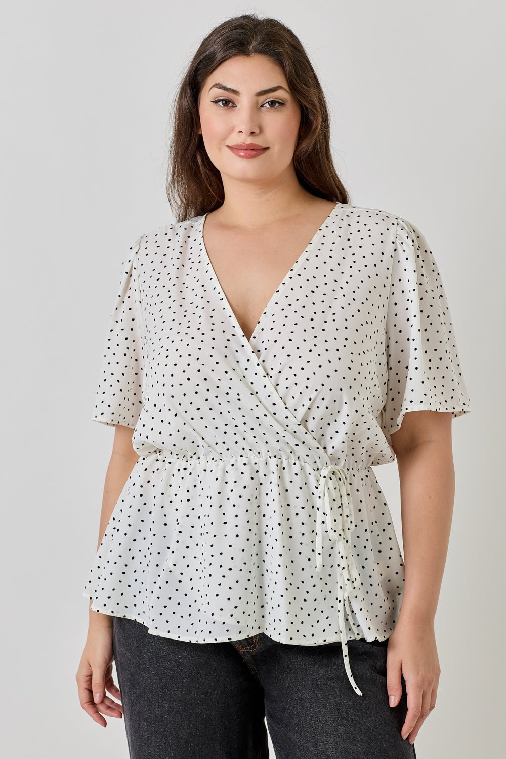 Image of West K Casey Plus Size Surplice Peplum Top Ivory Dot