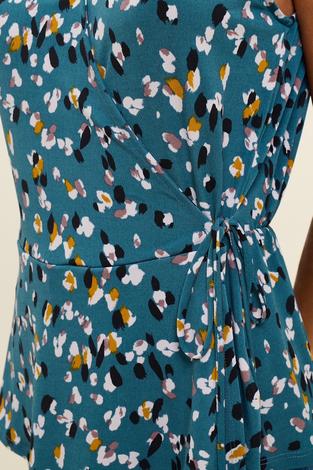 Image of West K Laura Sleeveless Surplice Knit Top Teal Animal