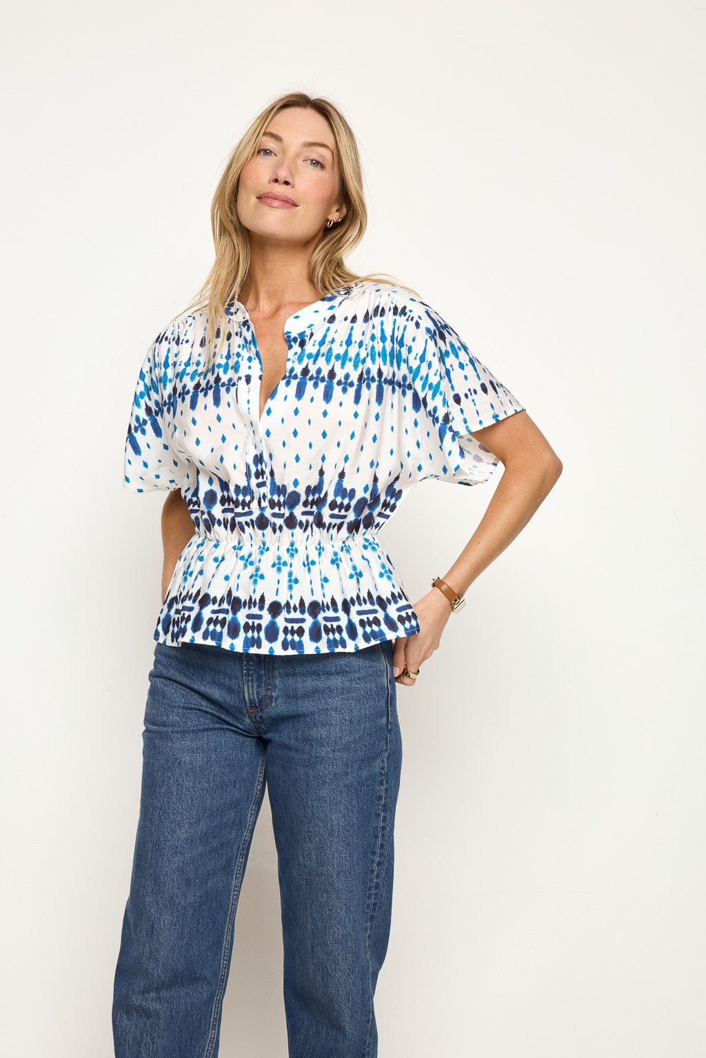 Image of West K Layla Dolman Sleeve Peplum Hem Top Blue Geo Border