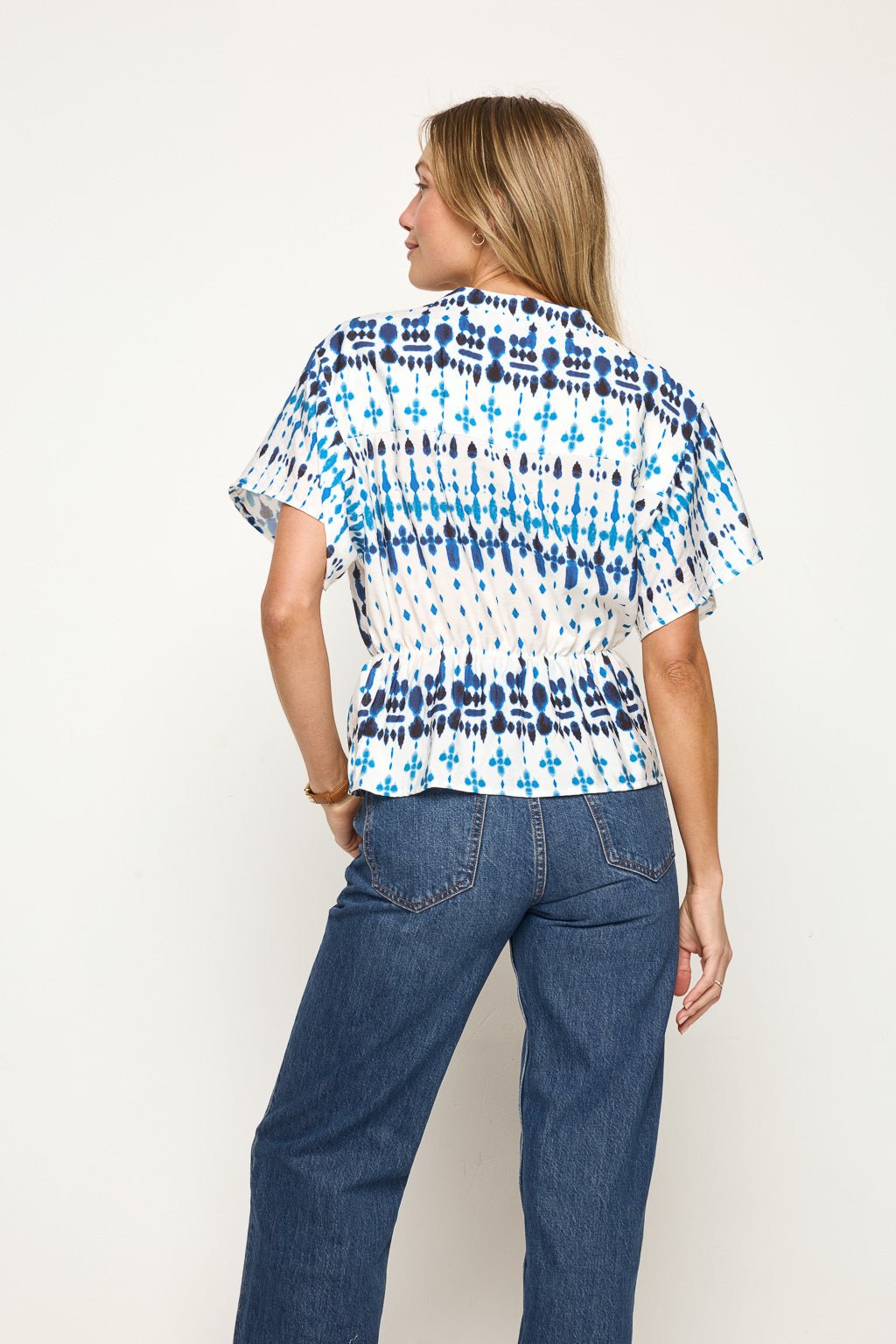 Image of West K Layla Dolman Sleeve Peplum Hem Top Blue Geo Border