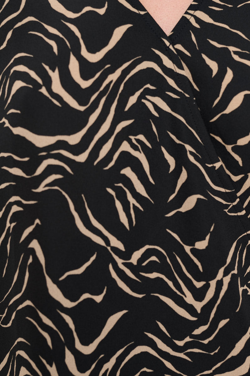 Image of West K Alexa Surplice Roll Tab Blouse Black Tan Abstract