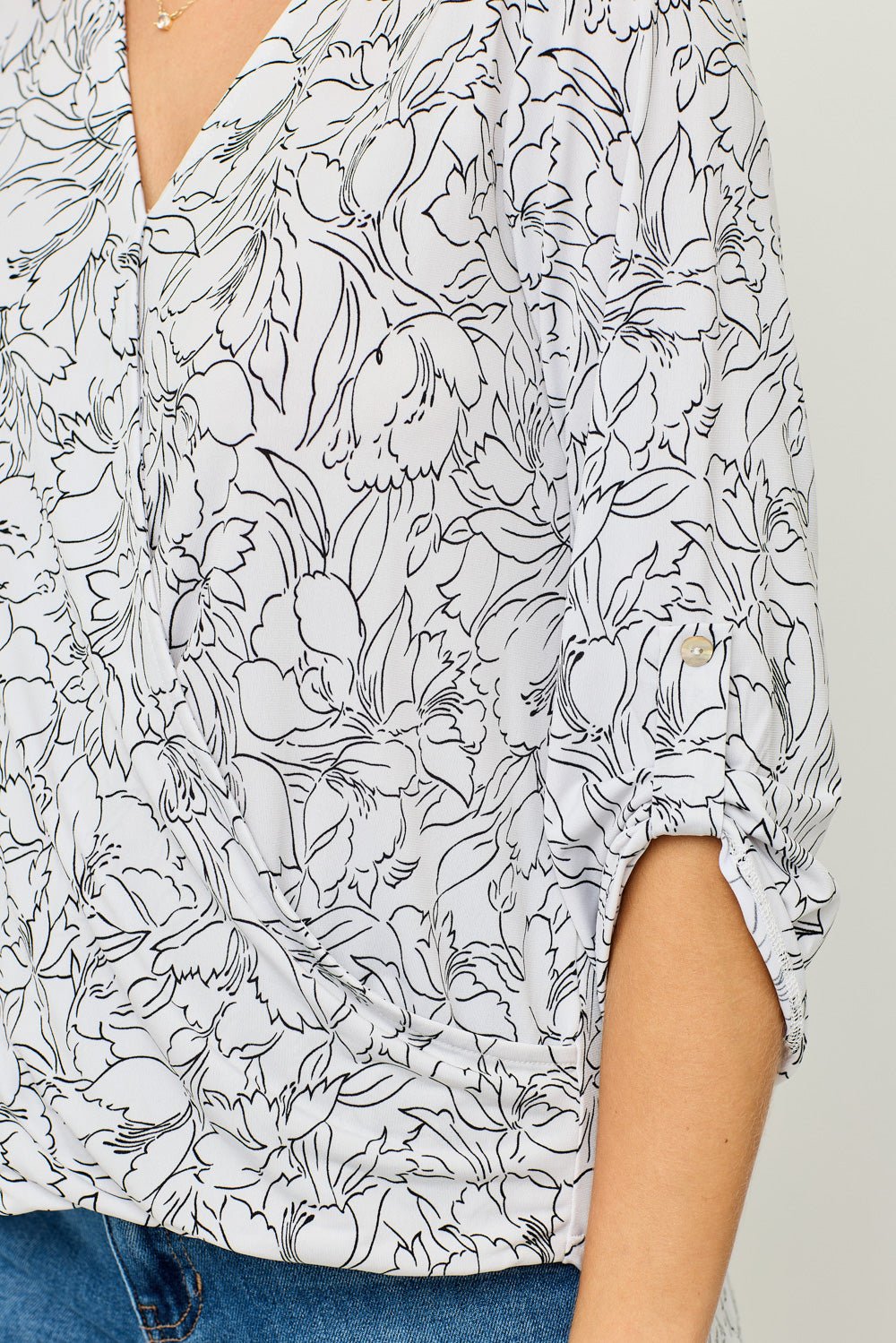 Image of West K Alexa Knit Surplice Roll Tab Blouse White Mono Floral