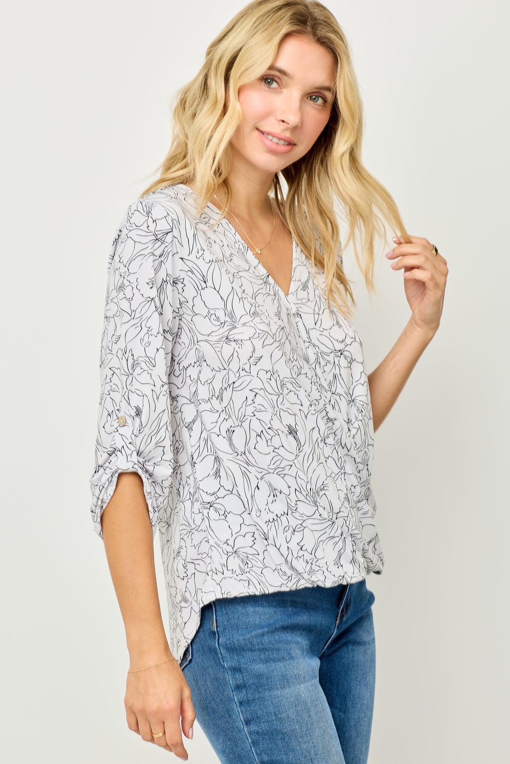 Image of West K Alexa Knit Surplice Roll Tab Blouse White Mono Floral