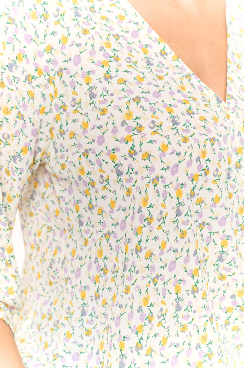 Image of West K Alexa Three Quarter Sleeve Surplice Rolltab Blouse Ivory Ditzy Floral