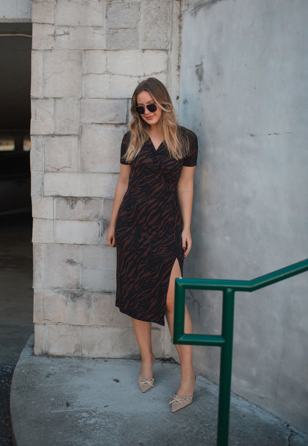 Image of West K Jocelyn Side Ruched Midi Dress Black Brown Zebra