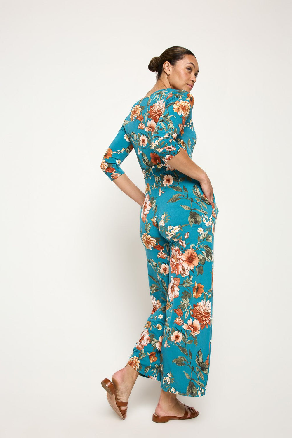 Image of West K Shay Surplice Neck Jumpsuit Turquoise Floral