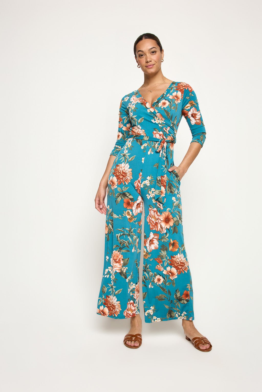 Image of West K Shay Surplice Neck Jumpsuit Turquoise Floral