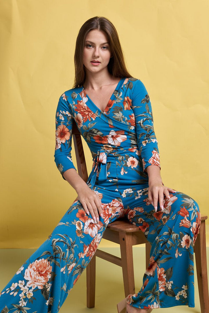 Image of West K Shay Surplice Neck Three Quarter Sleeve Jumpsuit Turquoise Floral