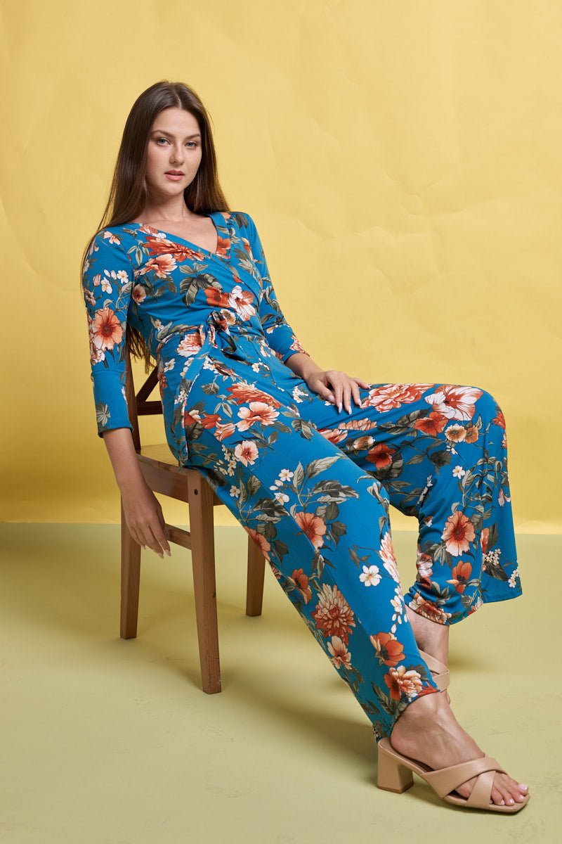 Image of West K Shay Surplice Neck Three Quarter Sleeve Jumpsuit Turquoise Floral