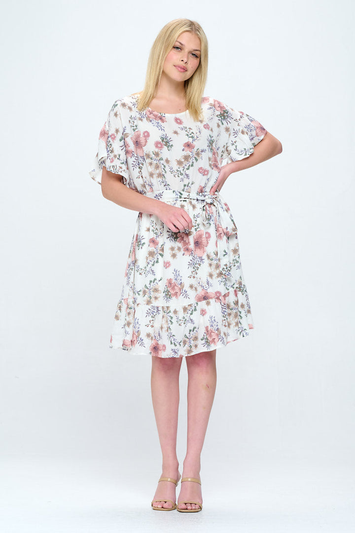 WEST K chic all season dress for all body types. Knee length with ruffle detail at sleeve and skirt hem with tie waist to accentuate your natural curves. Wear to your next event or for an everyday chic look!