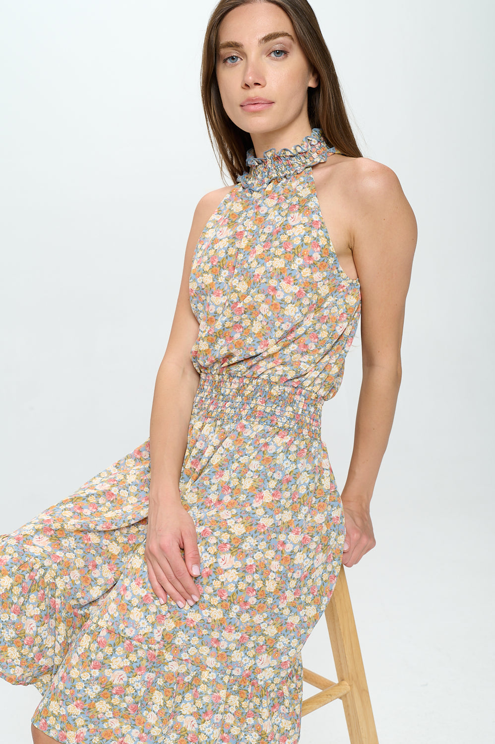 Printed High Neck Halter Dress with Smocking Detail at the neckline and waist.